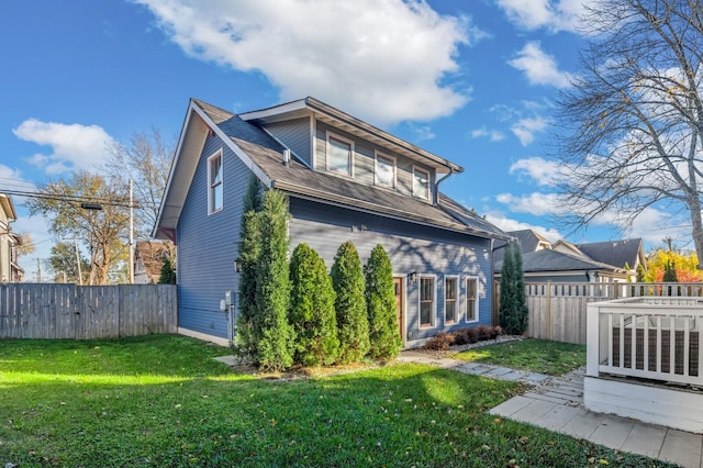 2510 Belmont Blvd, Nashville, TN 37212 - rear view of house with a lawn, central AC, and fence