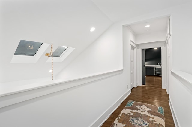 2510 Belmont Blvd, Nashville, TN 37212 - hallway featuring baseboards, recessed lighting, dark wood-style floors, and a skylight