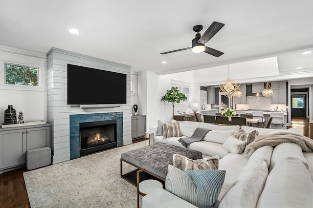 2510 Belmont Blvd, Nashville, TN 37212 - living room with ceiling fan with notable chandelier, recessed lighting, and a warm lit fireplace