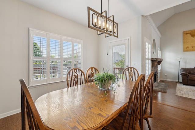 2142 Gold Valley Dr, Murfreesboro, TN 37130 - dining area with baseboards, a notable chandelier, wood finished floors, and vaulted ceiling