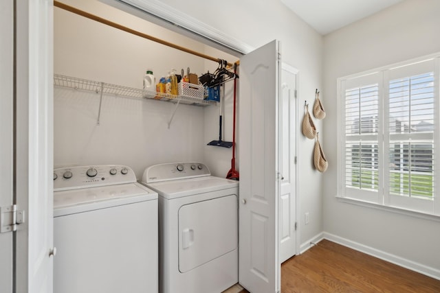 2142 Gold Valley Dr, Murfreesboro, TN 37130 - laundry area with washing machine and clothes dryer, laundry area, baseboards, and light wood-style flooring
