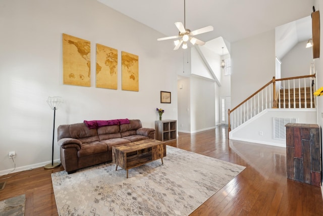 2142 Gold Valley Dr, Murfreesboro, TN 37130 - living room featuring hardwood / wood-style floors, stairs, a ceiling fan, baseboards, and visible vents