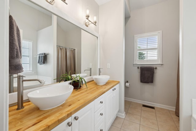 2142 Gold Valley Dr, Murfreesboro, TN 37130 - bathroom featuring visible vents, a sink, and a healthy amount of sunlight