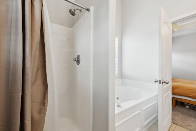 2142 Gold Valley Dr, Murfreesboro, TN 37130 - bathroom featuring tile patterned flooring, a shower stall, and a garden tub