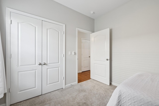 2142 Gold Valley Dr, Murfreesboro, TN 37130 - bedroom featuring a closet, baseboards, and carpet flooring