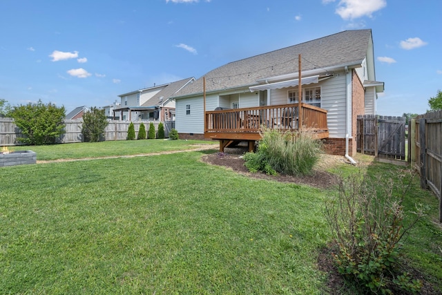 2142 Gold Valley Dr, Murfreesboro, TN 37130 - back of house with a yard, a shingled roof, a wooden deck, and a fenced backyard