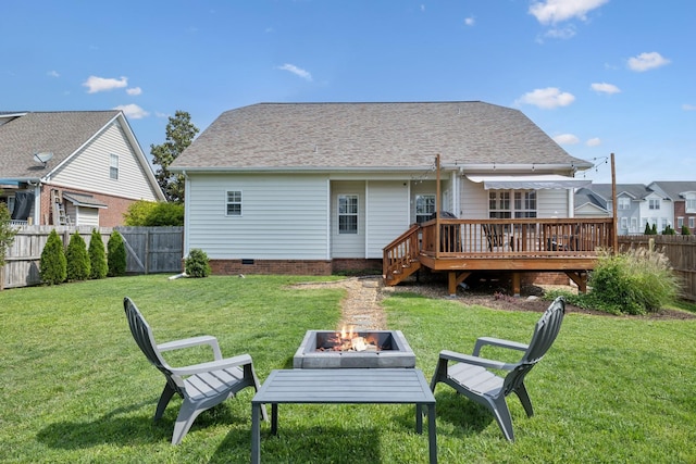 2142 Gold Valley Dr, Murfreesboro, TN 37130 - rear view of property featuring a fenced backyard, an outdoor fire pit, a yard, and a deck