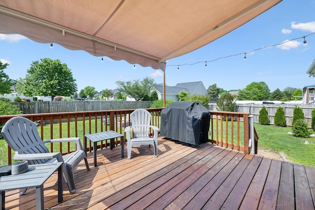 2142 Gold Valley Dr, Murfreesboro, TN 37130 - wooden deck featuring a lawn, a fenced backyard, and a grill