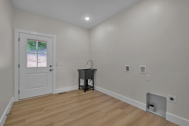 327 Turkey Creek Highway, Carthage, TN 37030 - laundry area with light wood finished floors, electric dryer hookup, laundry area, and baseboards