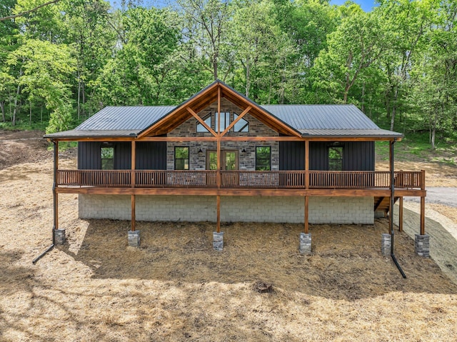 327 Turkey Creek Highway, Carthage, TN 37030 - back of house with board and batten siding, a wooden deck, and metal roof
