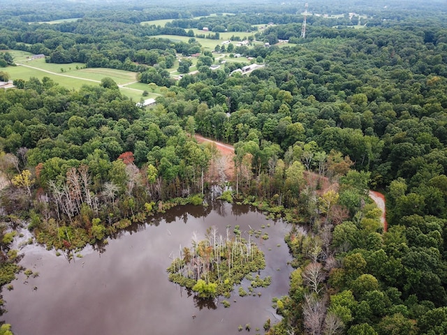 aerial view with a view of trees and a water view
