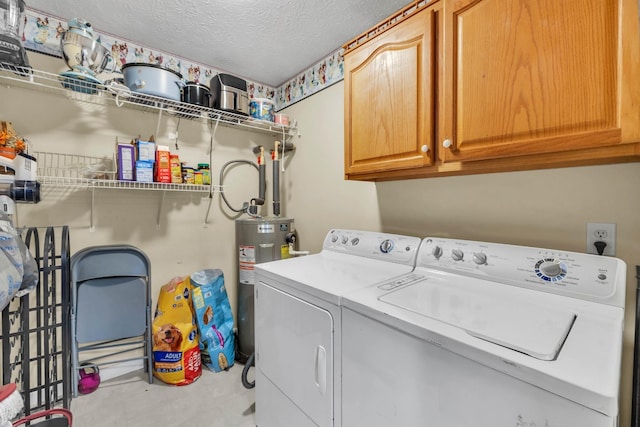 369 Talpha Dr, Dowelltown, TN 37059 - laundry area with cabinet space, a textured ceiling, washing machine and clothes dryer, and electric water heater