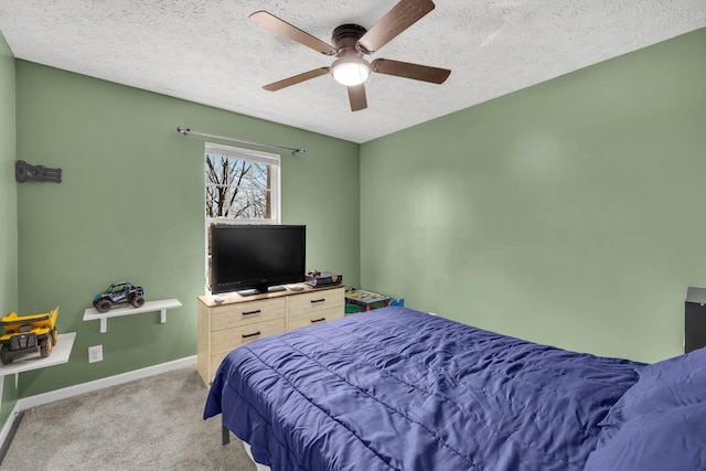369 Talpha Dr, Dowelltown, TN 37059 - bedroom with light colored carpet, baseboards, a ceiling fan, and a textured ceiling