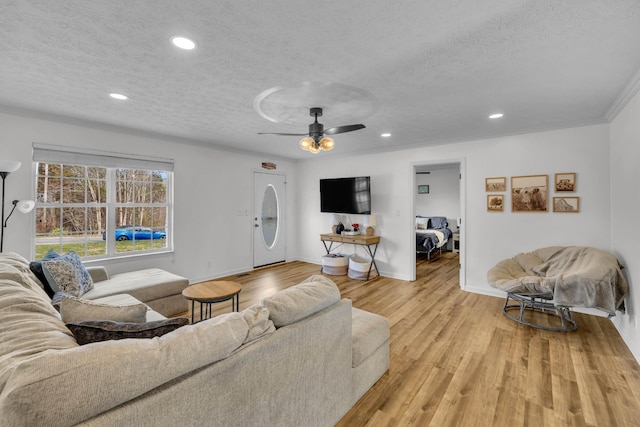 369 Talpha Dr, Dowelltown, TN 37059 - living room with recessed lighting, a textured ceiling, and baseboards