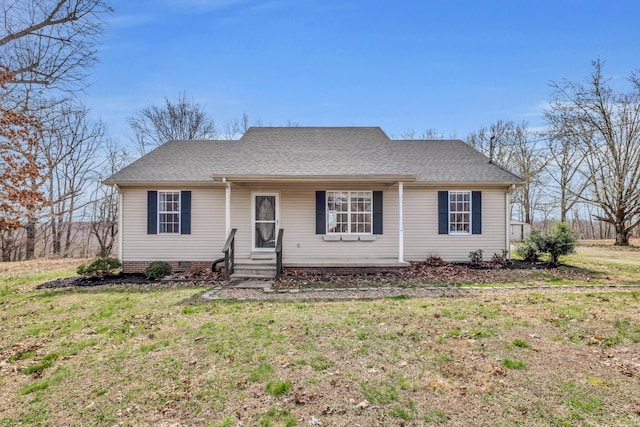 369 Talpha Dr, Dowelltown, TN 37059 - ranch-style house with a porch, a shingled roof, and a front lawn