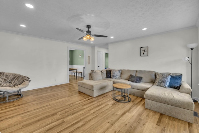 369 Talpha Dr, Dowelltown, TN 37059 - living room with recessed lighting, light wood-style floors, and ornamental molding