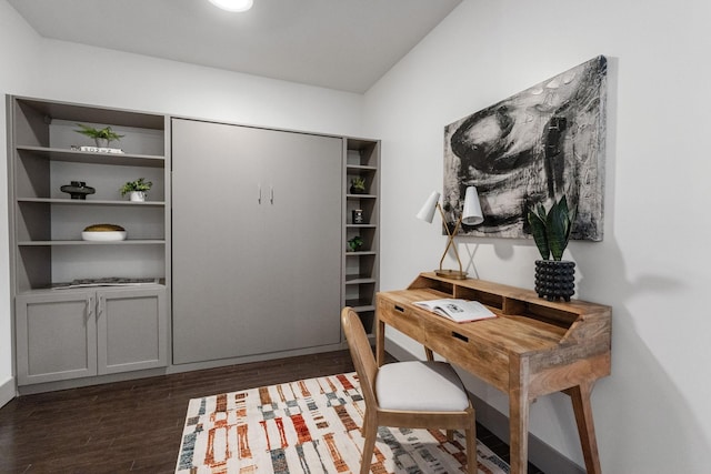 office area with dark wood-style flooring