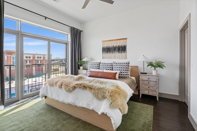 bedroom with wood finished floors, access to exterior, visible vents, baseboards, and ceiling fan