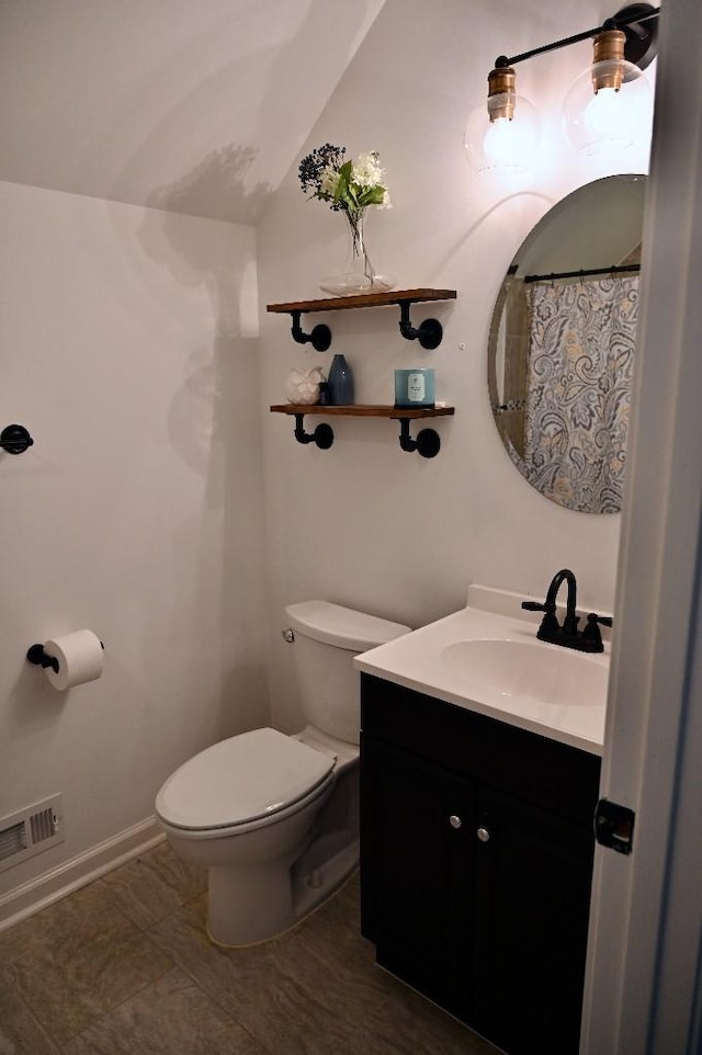 4310 Memory Ln, Adams, TN 37010 - bathroom featuring toilet and vanity