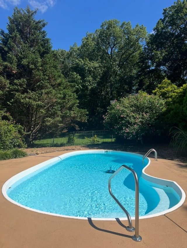 4310 Memory Ln, Adams, TN 37010 - view of swimming pool featuring fence and a patio area