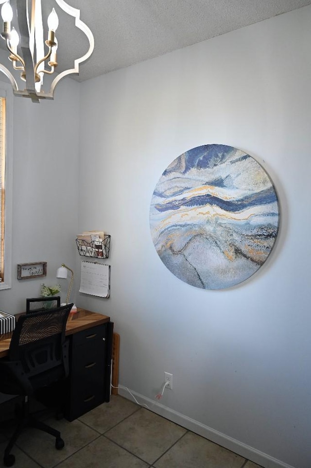 4310 Memory Ln, Adams, TN 37010 - office area featuring a chandelier, light tile patterned flooring, a textured ceiling, and baseboards