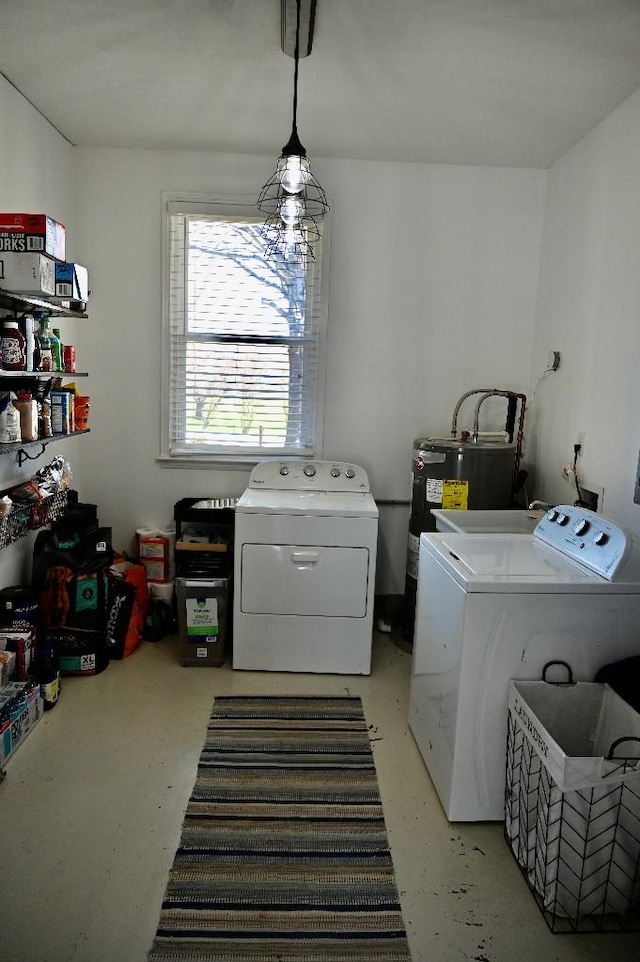 4310 Memory Ln, Adams, TN 37010 - clothes washing area featuring washing machine and clothes dryer and water heater
