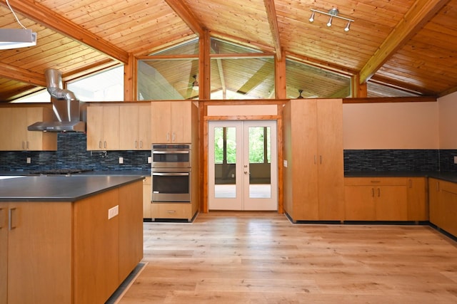1061 Ridgecrest Dr, Goodlettsville, TN 37072 - kitchen featuring double oven, dark countertops, wall chimney exhaust hood, wood ceiling, and backsplash