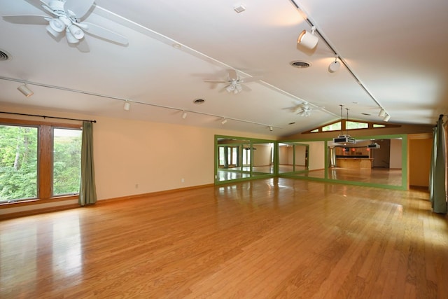 1061 Ridgecrest Dr, Goodlettsville, TN 37072 - spare room with track lighting, light wood-style flooring, a ceiling fan, baseboards, and lofted ceiling