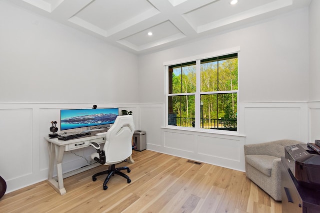 office area featuring a wainscoted wall and a decorative wall