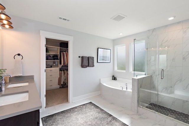 full bath featuring a bath, visible vents, a shower stall, and marble finish floor