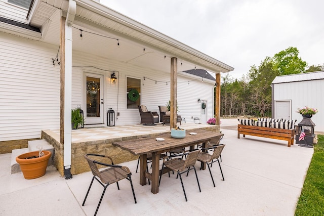 view of patio with outdoor dining area