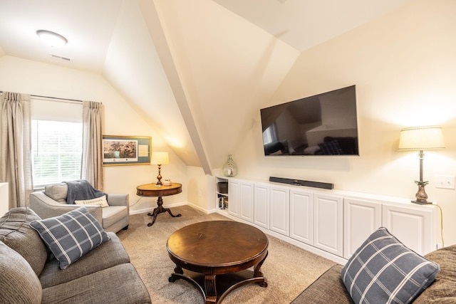 living room with light colored carpet and lofted ceiling