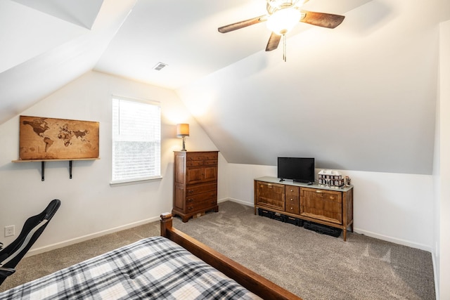 bedroom featuring carpet, lofted ceiling, visible vents, baseboards, and ceiling fan
