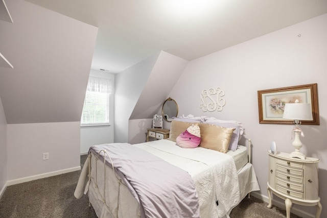bedroom featuring carpet floors, vaulted ceiling, and baseboards