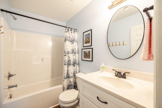 full bathroom with shower / tub combo, toilet, and vanity