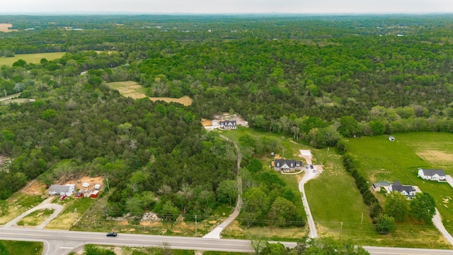 aerial view featuring a view of trees