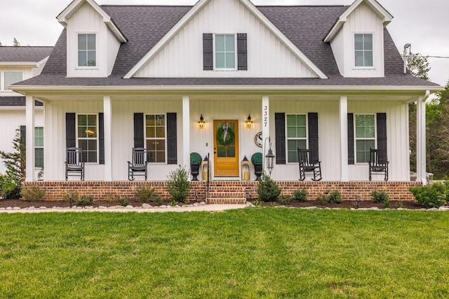 modern farmhouse style home with board and batten siding, roof with shingles, and covered porch