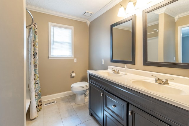 full bathroom featuring toilet, crown molding, and a sink