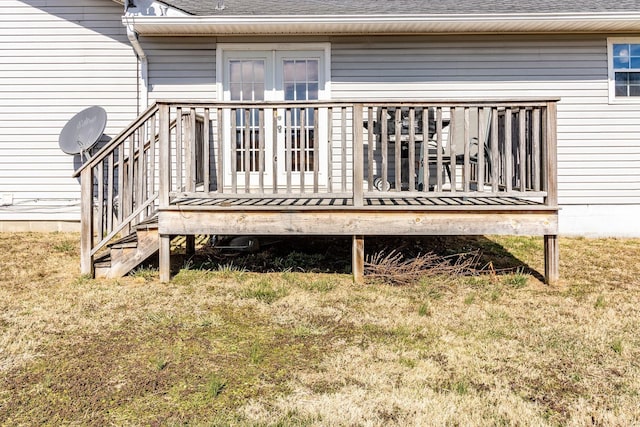 deck featuring a lawn