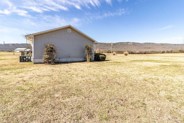 view of home's exterior featuring a lawn