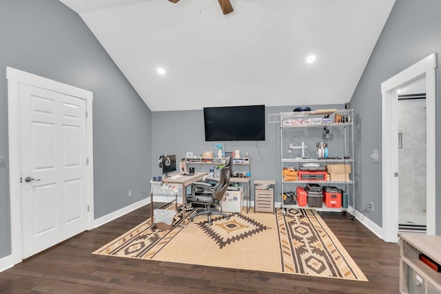 office space featuring a ceiling fan, baseboards, vaulted ceiling, and wood finished floors