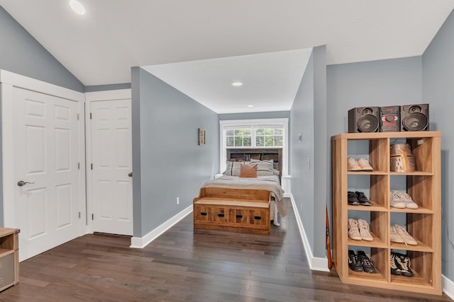 bedroom featuring recessed lighting, baseboards, dark wood finished floors, and lofted ceiling