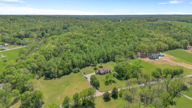 drone / aerial view with a view of trees