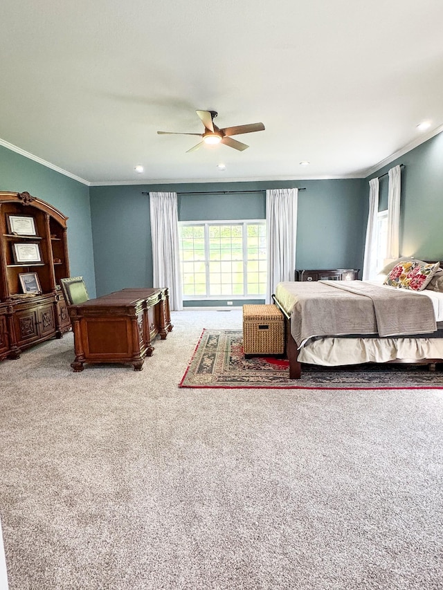 carpeted bedroom with crown molding, a ceiling fan, and recessed lighting