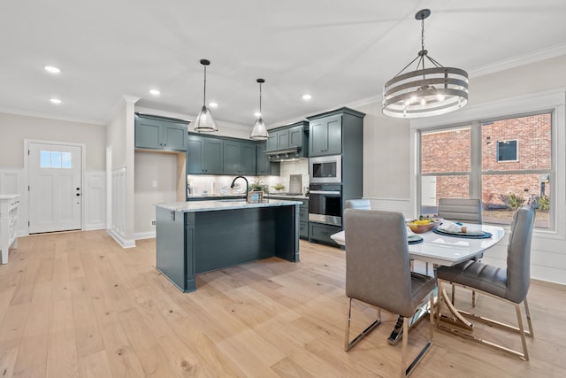 1111 Joe Martin Ln, Lebanon, TN 37087 - kitchen featuring a chandelier, appliances with stainless steel finishes, and crown molding