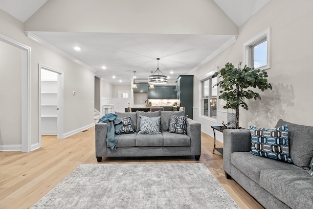 1111 Joe Martin Ln, Lebanon, TN 37087 - living room featuring light wood-type flooring, lofted ceiling, recessed lighting, and ornamental molding