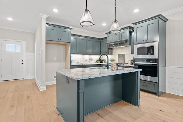 1111 Joe Martin Ln, Lebanon, TN 37087 - kitchen featuring crown molding, appliances with stainless steel finishes, light stone counters, and a sink