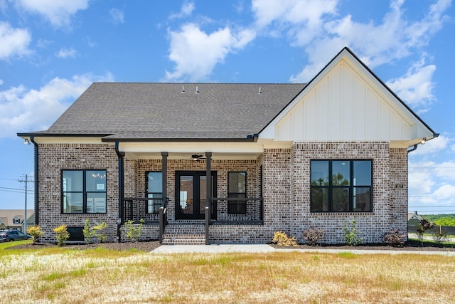 1117 Joe Martin Ln, Lebanon, TN 37087 - back of property featuring brick siding, a porch, roof with shingles, and board and batten siding