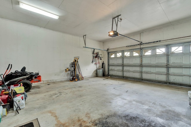 garage featuring a garage door opener