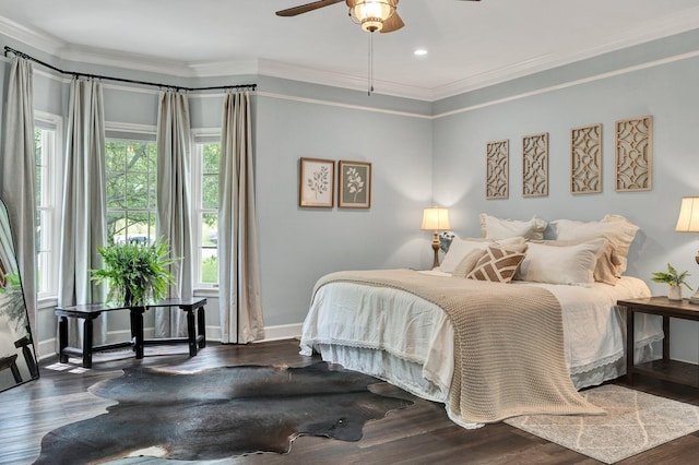 bedroom featuring baseboards, dark wood-style floors, recessed lighting, and ornamental molding